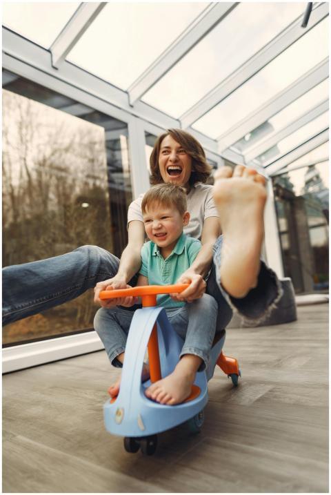 A joyful moment of a mother and son playing indoor