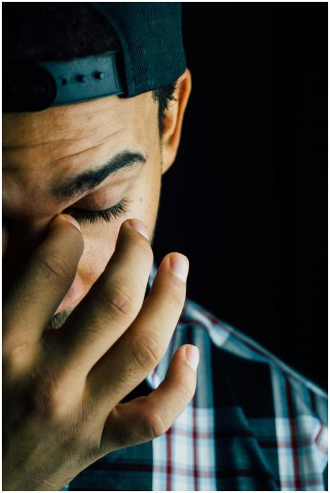 A close-up portrait capturing the emotional expres