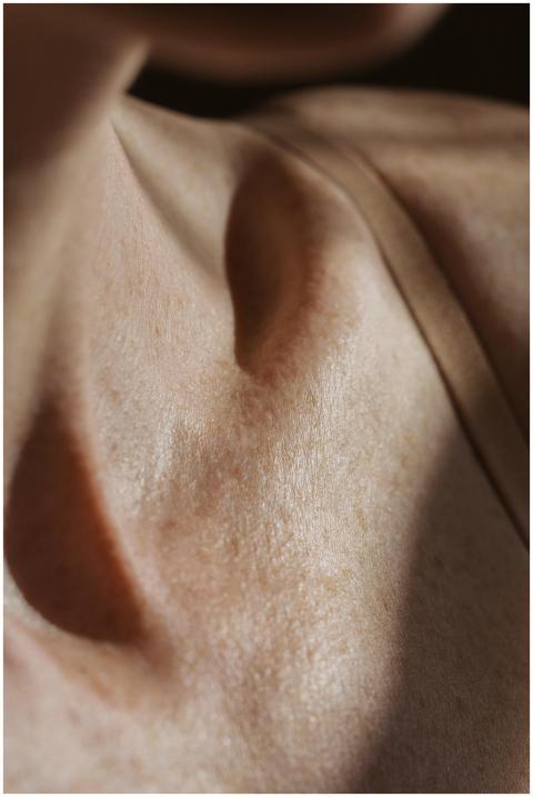 High-resolution close-up of a woman's collarbone a