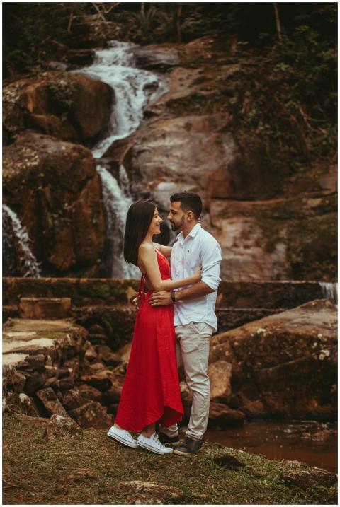 Romantic couple in nature, embracing near a serene