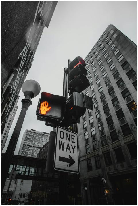 Low angle view of traffic lights and buildings in