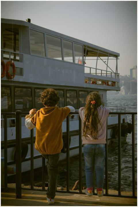 Children Watching Boat Seaside