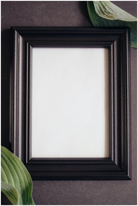 Close-up of an elegant black picture frame with gr
