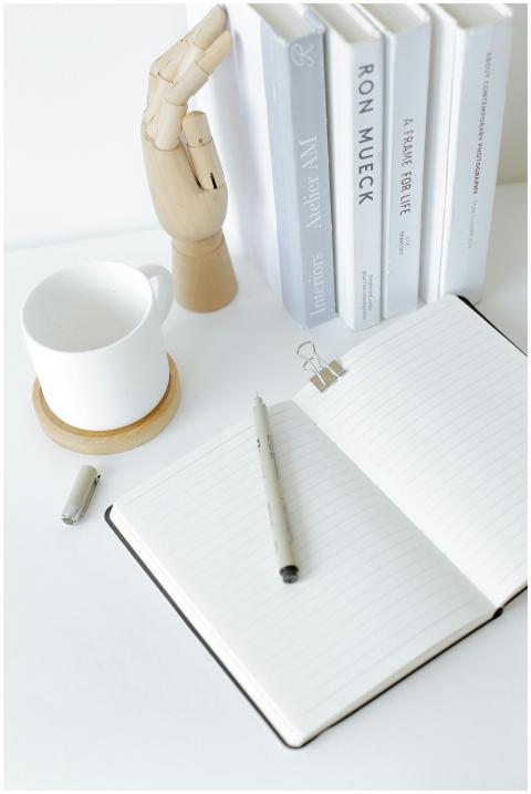 A clean and organized desk setup featuring an open