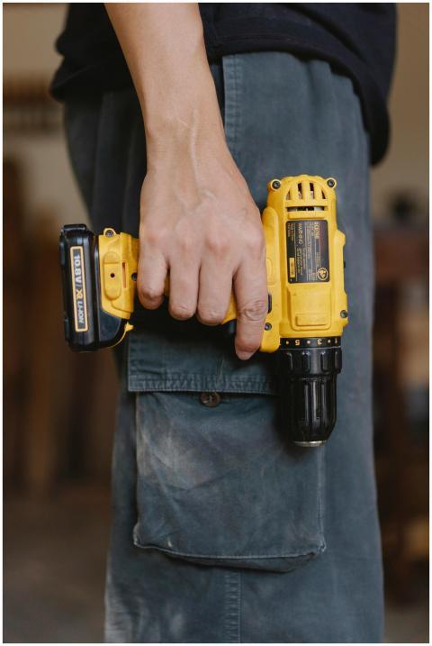 Side view of unrecognizable craftsman in casual cl