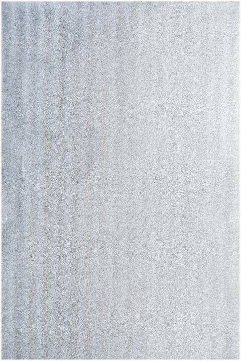 Close-up of a monochrome gray textured surface, id