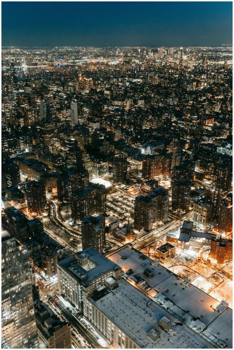 Drone view of contemporary multistory buildings wi