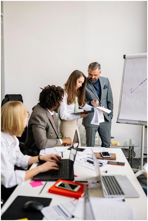 A diverse team collaborating in a modern office wi