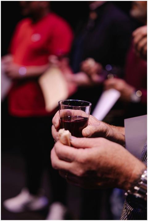 Intimate capture of communion ritual with bread an