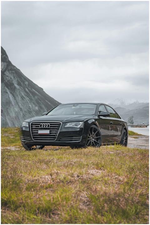 Luxury car parked in Leuk, Switzerland, with drama