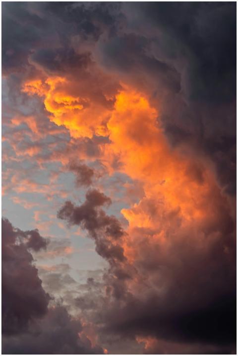 Captivating cloud formation at sunset showcasing v