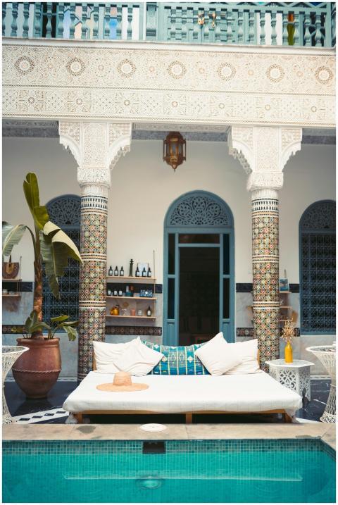 Elegant Moroccan courtyard featuring a luxurious p