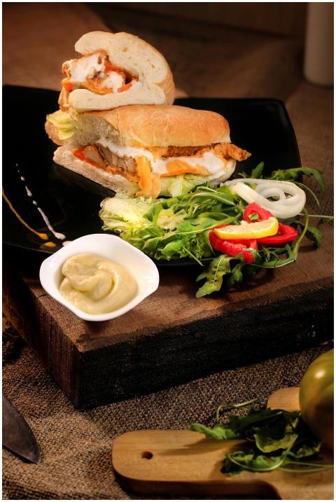 Delicious gourmet sandwich with fresh salad and cr