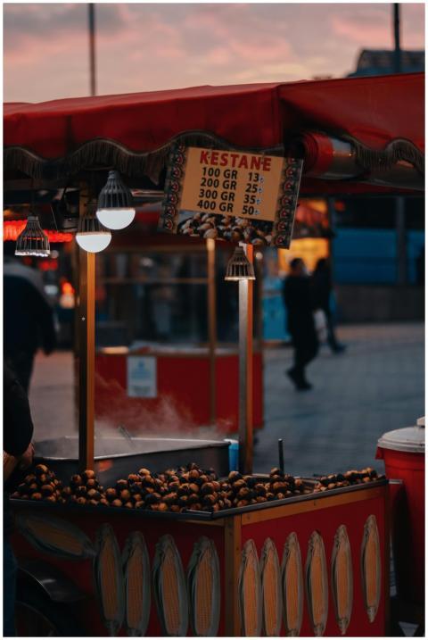 Urban street scene of a chestnut stall at twilight