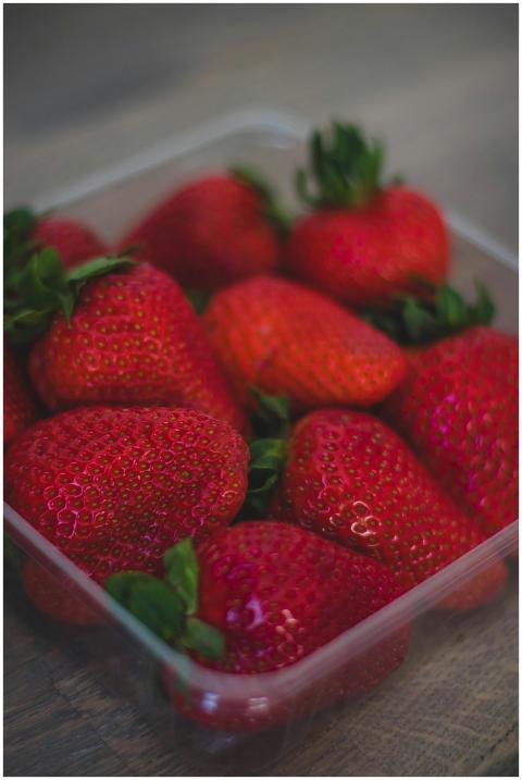 Close-up of fresh, juicy strawberries packed in a