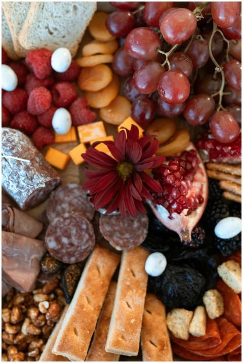 Artfully arranged charcuterie board featuring meat