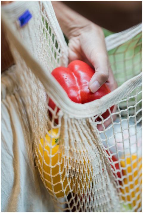 A vibrant photo of red and yellow bell peppers in