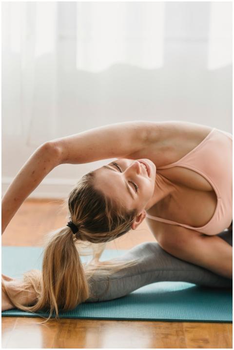 Graceful young female with long blond hair in acti