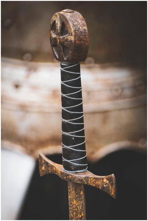 Detailed image of a rusted medieval sword handle s