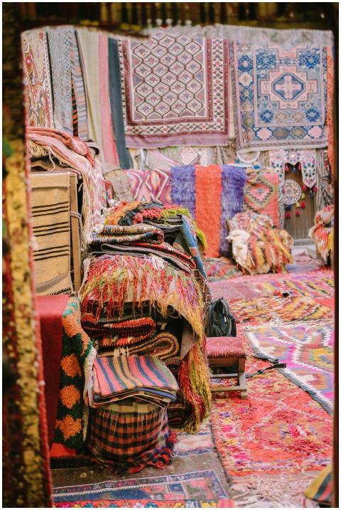Vibrant handmade rugs and textiles on display in a