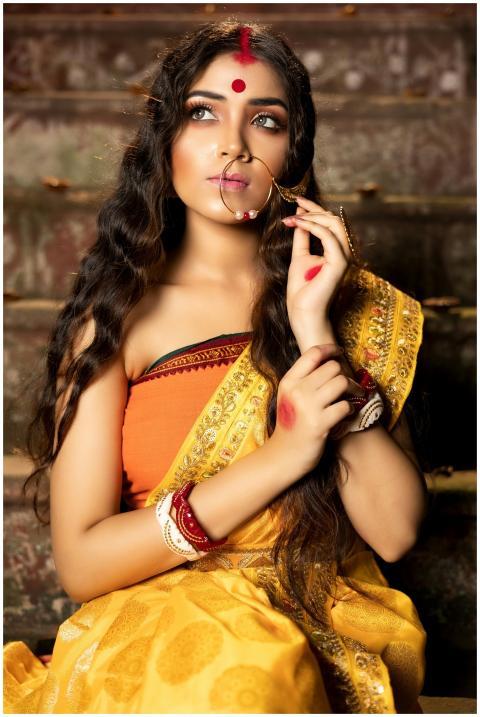 Beautiful Indian bride in traditional attire posin