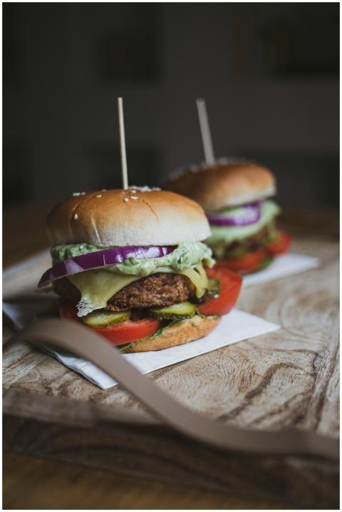 Delicious gourmet burgers with lettuce, tomato, an