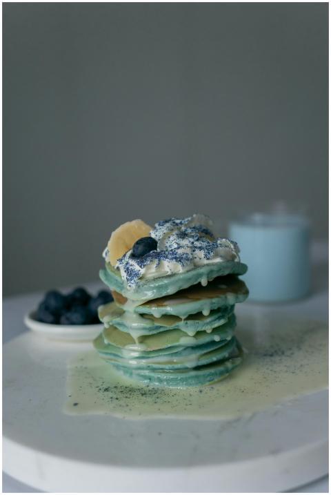 A mouthwatering stack of blueberry pancakes topped
