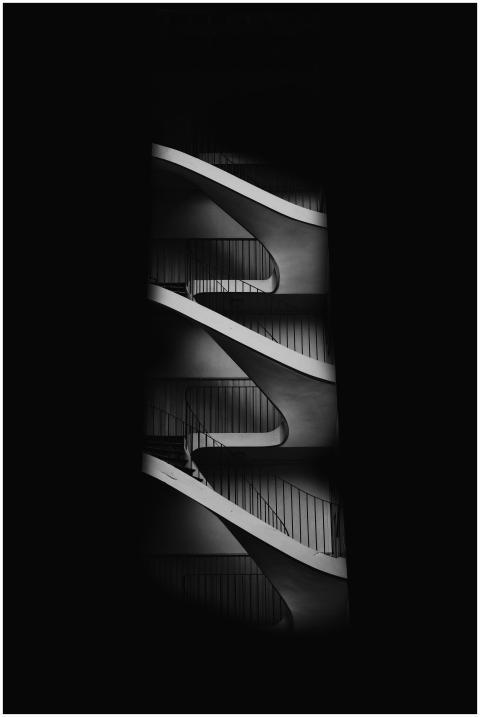 Dynamic black and white architectural abstract fea