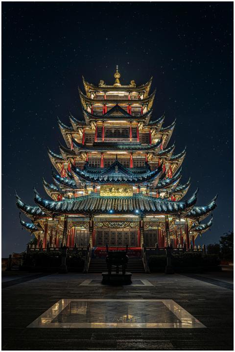 Stunning view of an illuminated pagoda temple in C
