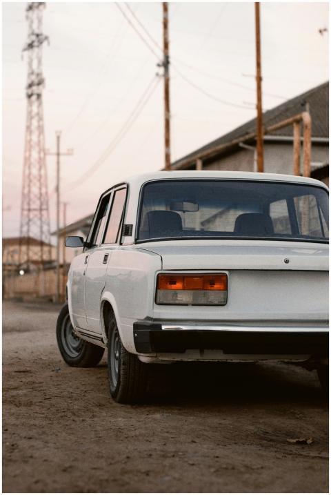 Classic VAZ-2107 parked on a dirt road in Salyan,