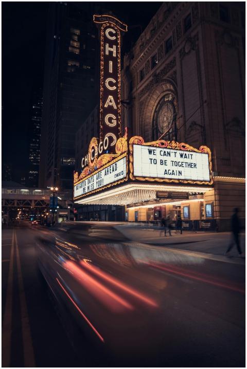 Illuminated facade of Chicago Theatre with vibrant