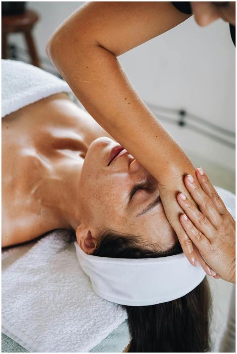 A serene spa experience featuring a woman receivin