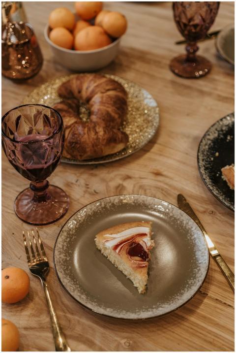 A beautifully arranged dessert table featuring cak
