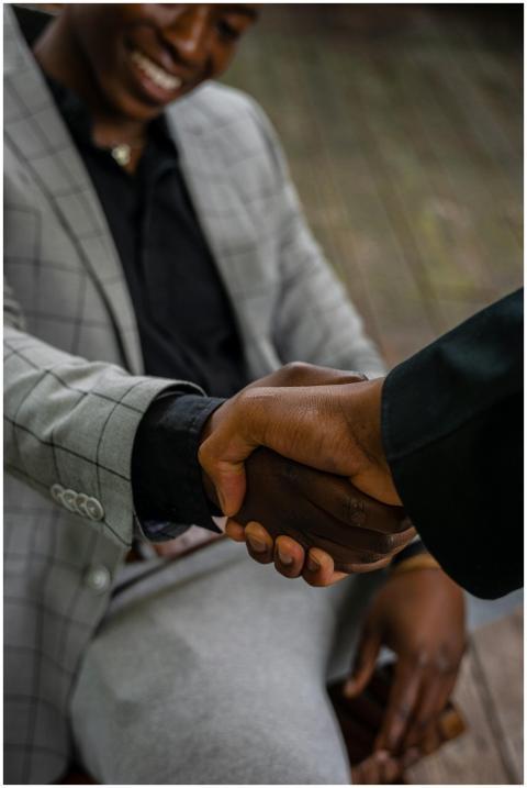 Close-up of a handshake between two businessmen in