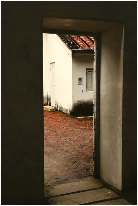 View of a rustic Taiwanese alleyway captured throu