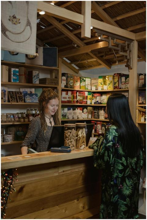 Woman customer interacting at a wood-accented stor