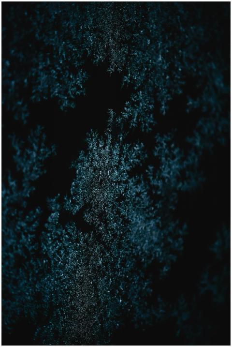 Close-up of frost crystals forming an abstract pat