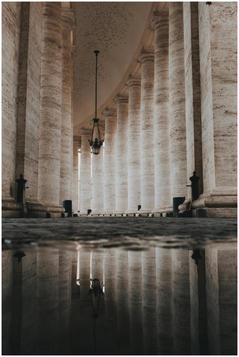 Dramatic reflection of columns at St. Peter's Squa
