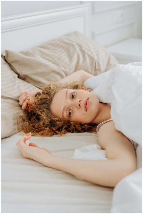 A serene morning scene featuring a woman resting c