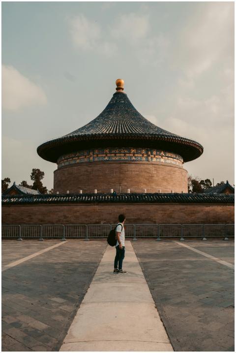 A backpacker stands at the iconic Temple of Heaven