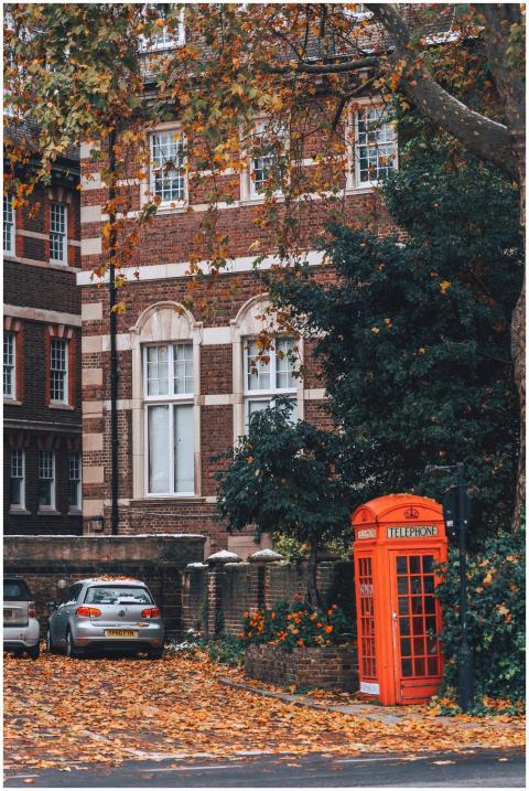 Quintessential London street view featuring a red