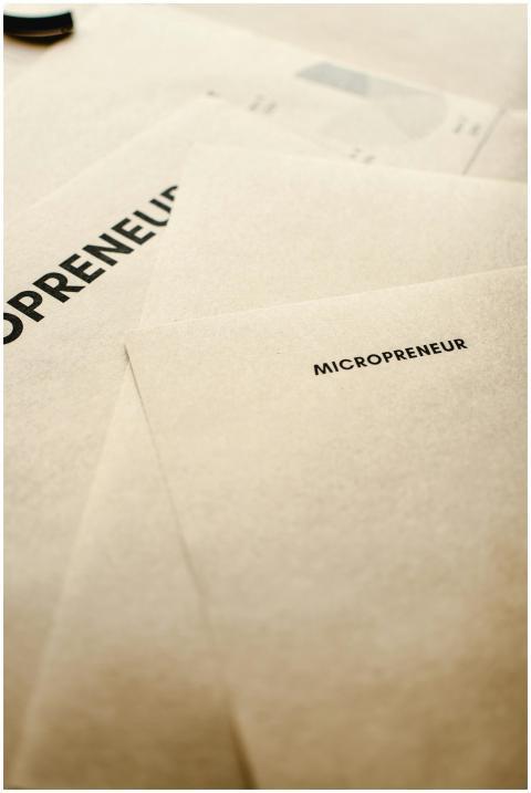 Close-up of micropreneur paperwork representing st