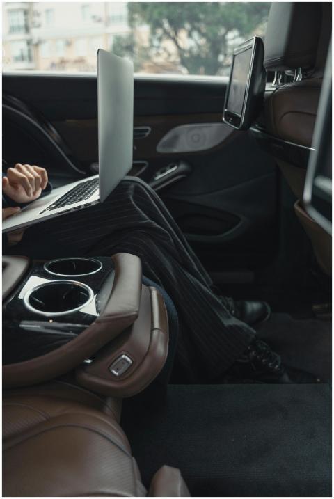 A professional woman working remotely on a laptop