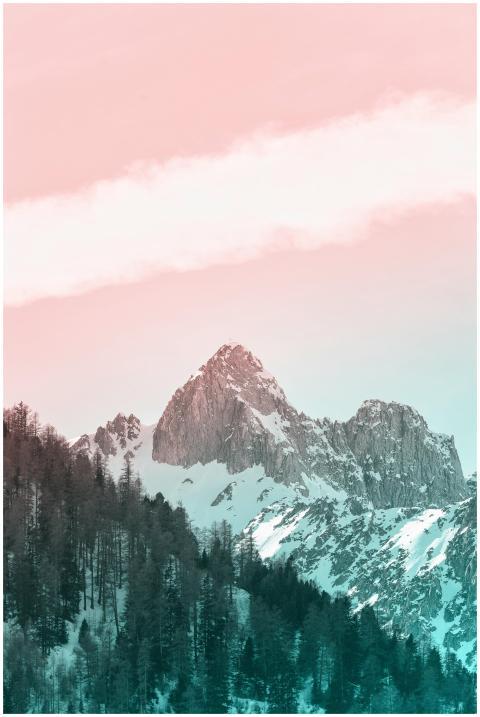 A breathtaking view of a snow-covered mountain pea