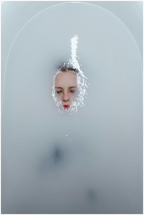 A serene moment of solitude with a woman underwate