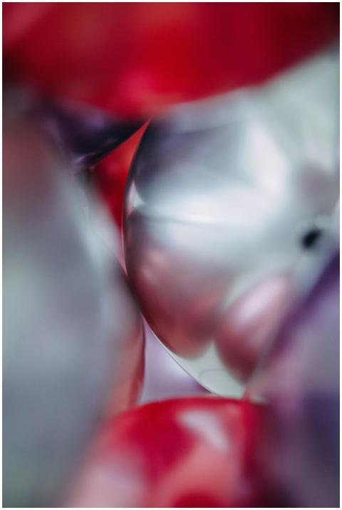 Vibrant close-up of colorful balloons in soft focu