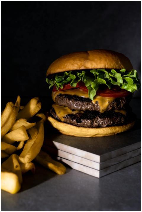 A mouthwatering double cheeseburger with crispy fr