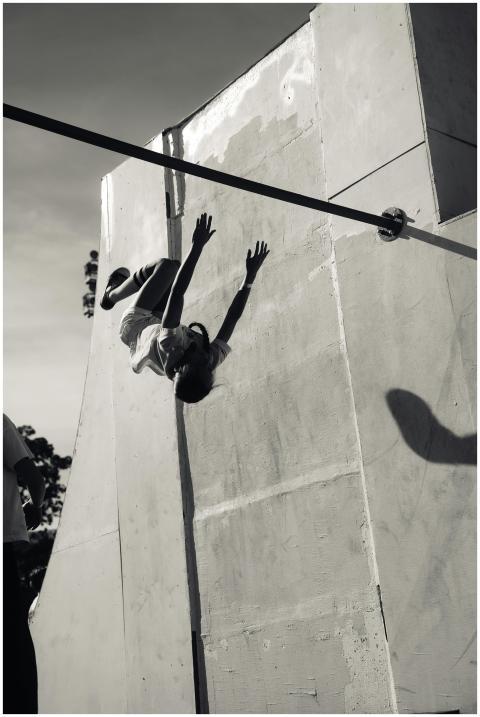 Dynamic Skateboarder Mid Flip