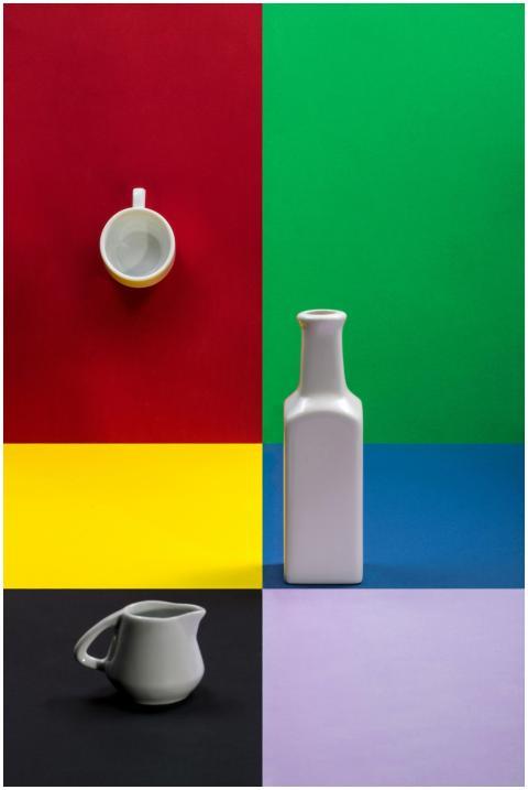 Vibrant minimalist composition featuring white cer