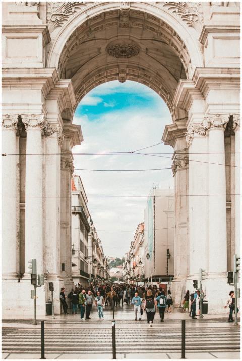 Explore the iconic Lisbon arch and vibrant street
